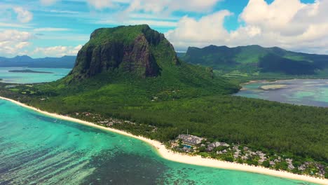 Beautiful-bird's-eye-view-of-mount-Le-Morne-Brabant-and-the-waves-of-the-Indian-ocean-in-Mauritius