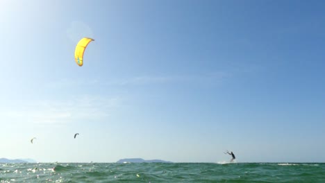Kite-surfer-practicing-kitesurfing-for-sport-concept-and-healthy-lifestyle
