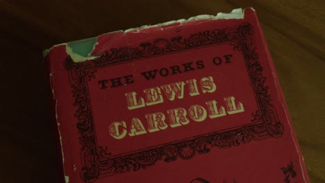 Close-Up-Pan-Right-of-the-Cover-of-a-Lewis-Carroll-Collection-Book