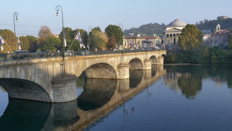 Vittorio-Emanuele-Bridge-Across-Po-River-In-Turin,-Italy-With-Church-Of-Gran-Madre-di-Dio-In-Background-At-Daytime