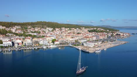 Aerial-drone-video-of-Argostoli,-famous-city-and-capital-of-Cefalonia-island-at-dawn,-Ionian,-Greece