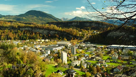 Aerial-footage-of-Feldkirch-Town-in-Vorarlberg-Austria-during-the-fall-season-with-colorful-leaves-and-mountain