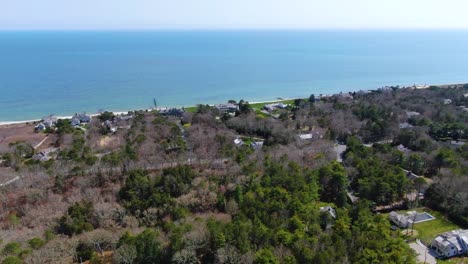 Osterville-township-near-Atlantic-ocean-coastline,-aerial-view