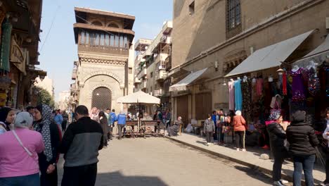 People-in-pedestrian-street-of-Cairo-historic-town-center,-Egypt