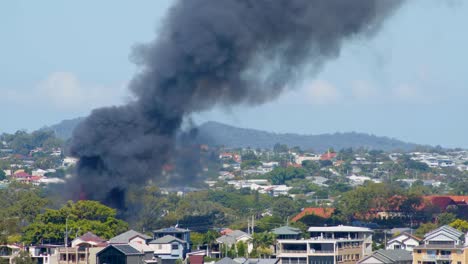 Black-Smoke-and-lapping-flames-can-seen-from-the-large-destructive-suburban-fire