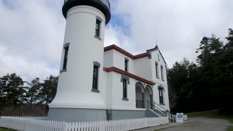 Slow-motion-tilt-down-of-a-restored-lighthouse-at-Fort-Casey-in-Washington-State