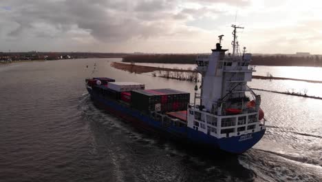 Aerial-Along-Port-Side-Of-Greetje-Cargo-Ship-Along-Oude-Maas