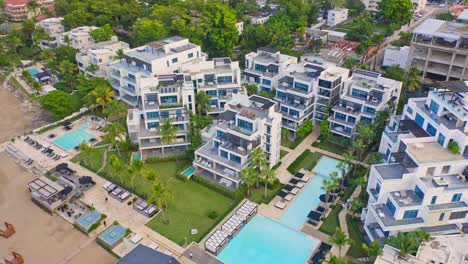 Aerial-View-Of-Hotels-Of-The-Ocean-Club,-Playa-Imbert,-Dominican-Republic---drone-shot