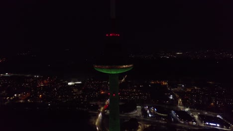 AERIAL:-Vilnius-Television-Tower-Shines-with-Vivid-Colours-on-Night-of-Re-establishment-of-the-State-of-Lithuania