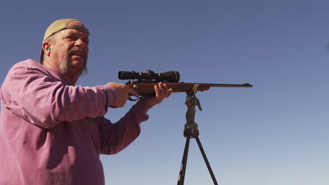 A-man-uses-a-bolt-action-rifle-for-target-practice-before-deer-hunting-on-the-Colorado-range