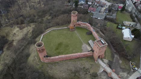 Drone-Aerial-View-of-Czersk-Castle-in-Gora-Kalwaria-Poland-during-clear-daytime