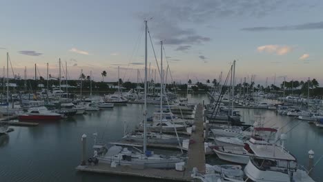 Yachts-and-boats-during-sunset,-Ko-Olina,-Hawaii-Marina