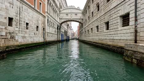 Low-angle-unusual-pov-of-Ponte-Dei-Sospiri-or-Bridge-of-Sighs,-Venice-in-Italy
