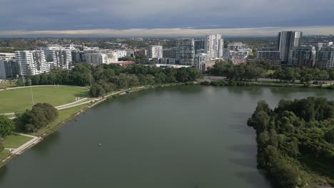 Aerial-panorama-flight-over-the-Cooks-River-at-Tempe,-Wolli-Creek