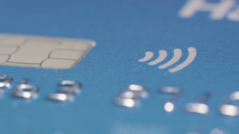TRACKING-MACRO-SHOT-across-contactless-symbol-and-chip