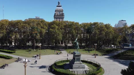 Aerial-view-of-the-square-with-old-trees-famous-building-and-people-enjoying-the-sunshine-afternoon