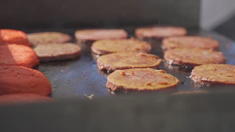 Vegan-veggie-burger-fillet-patties-frying-on-grill-stove