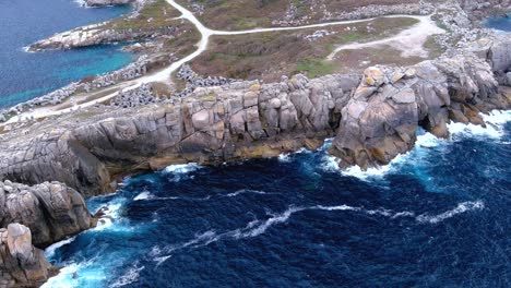 Aerial-drone-shot-over-place-known-as-paper-cliffs,-in-the-area-of-Morás,-Xove,-Lugo,-Galicia,-Spain