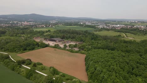 Aerial-orbit-around-an-abandoned-military-airfield-on-a-cloudy-spring-day-in-Germany