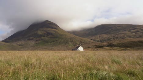 An-Isolated-House-on-a-Grassy-Field-in-the-Mountains-of-Scotland-on-The-Isle-of-Skye
