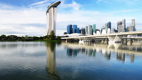 Calm-morning-at-Marina-Bay-along-the-Sheares-Bridge-with-the-water-reflecting-the-buildings
