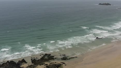 View-From-Above-Of-Godrevy-Beach,-Golden-Sand-Beach-On-The-Coast-Of-Cornwall-In-UK