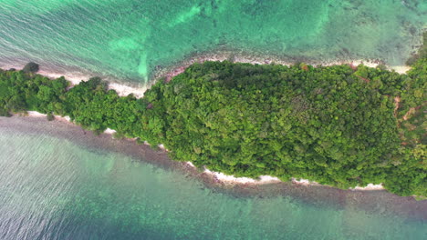 Aerial-view-of-a-island-surrounded-by-turquoise-color