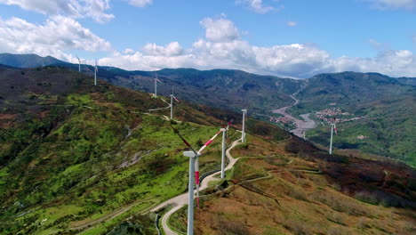 Drone-flight-over-wind-turbines-on-mountain