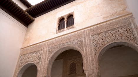 Slow-motion-cinematic-tilt-down-inside-interior-courtyard-of-Alhambra-Palace