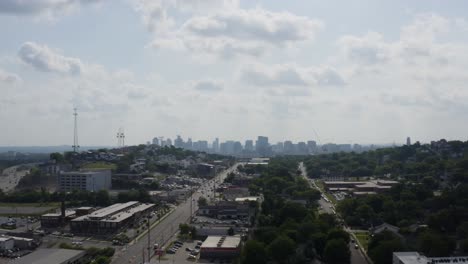 Nashville-Tennessee-Skyline-Aerial-through-Hills-from-City-West