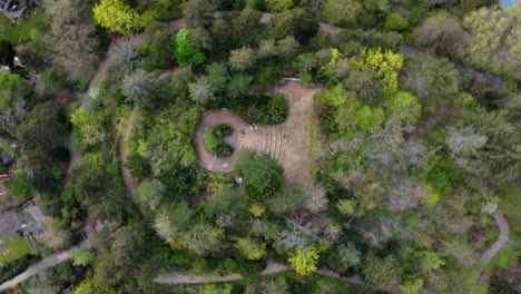 Trees-Stairs-and-a-monument-Stunning-aerial-view-flight-rotation-360-drone-shot-bird's-eye-view-drone-footage-of-Berlin-Tempelhof-Park-District-Spring-2022-Cinematic-view-from-above-by-Philipp-Marnitz
