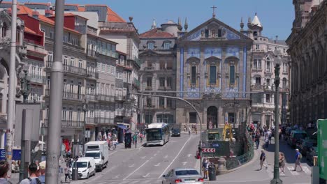 Exterior-view-of-tourists-in-front-of-Igreja-de-Santo-António-dos-Congregados-in-Historic-Centre-of-Porto,-Portugal