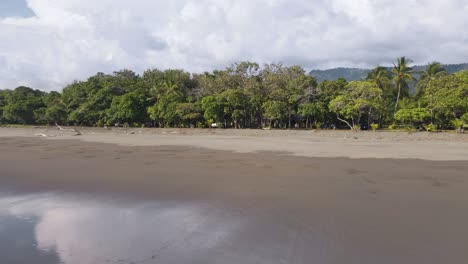 Shoreline-of-Playa-Linda-a-quiet-tropical-beach-hidden-away-on-the-Central-Pacific-Coast-of-Costa-Rica