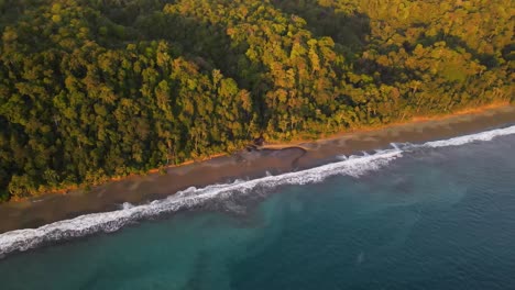 Slow-approaching-aerial-view-of-the-Osa-Peninsula-coast-in-Costa-Rica