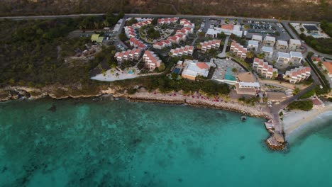 Aerial-trucking-shot-of-the-big-vacation-resort-on-the-tropical-island