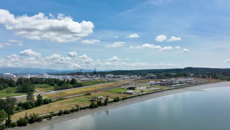 Ultra-wide-aerial-view-of-an-oil-refinery-with-Fidalgo-Bay-in-the-foreground