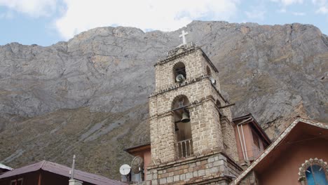 Huacaya-church-bell-tower-and-mountain-4k