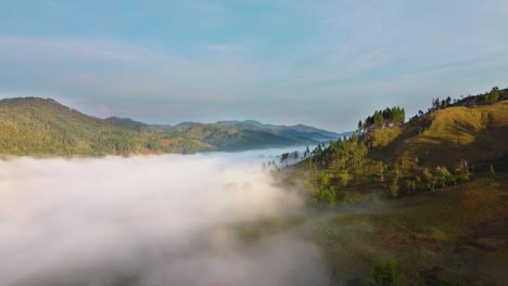 Aerial-shot-of-a-foggy-mountain