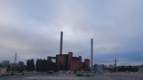 Overcast-timelapse:-Activity-around-grey-day-power-plant-in-Helsinki