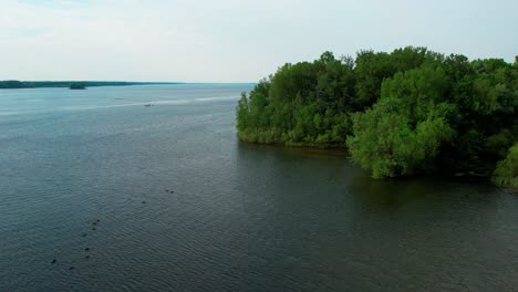 A-drone-shot-of-a-beautiful-calm-lake-in-day-time