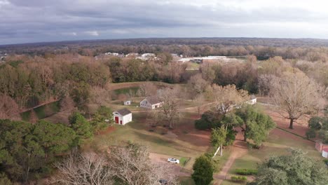 Wide-aerial-shot-of-the-historic-Melrose-Plantation-slave-quarters-in-Natchez,-Mississippi