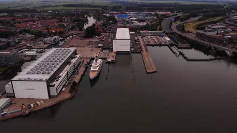 Aerial-View-Of-Moored-Luxury-Yacht-At-Oceanco-Shipyard-Marina-Located-In-Alblasserdam-On-2-July-2022