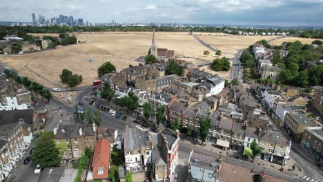 Blackheath-London-UK-reverse-reveal-drone-aerial-view-in-summer-drought