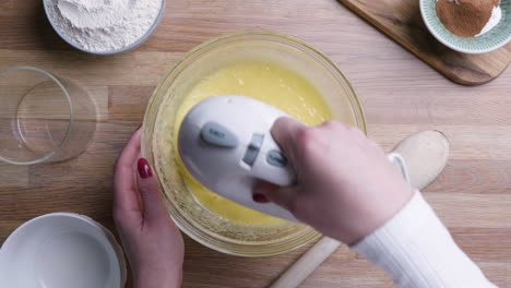Mixing-Carrot-Cake-Batter-By-Electric-Handheld-Beater