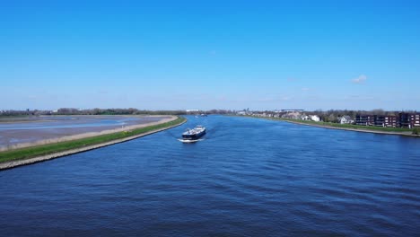 Tank-Vessel-Sailing-At-Inland-Waterway-Of-Noord-River-Near-Hendrik-Ido-Ambacht,-Netherlands