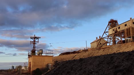 As-the-sunset-over-the-Junction-Mine-Broken-hill-NSW-Australia-in-the-golden-hour-after-a-storm-has-passed