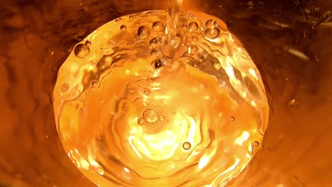 Slomo-shot-of-water-being-poured-into-glass