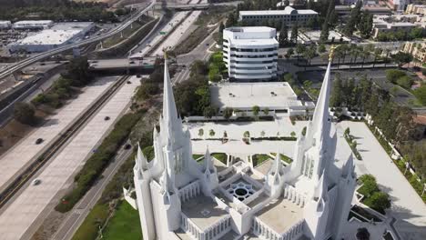 Aerial-rising-above-Temple,-Church-of-Latter-day-Saints-religious-building,-La-Jolla,-California