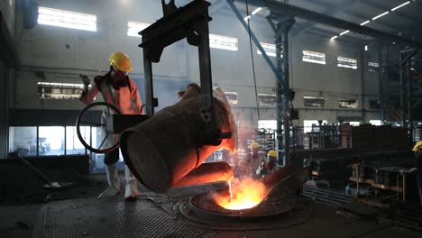 Worker-controlling-metal-melting-in-furnaces