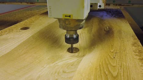 Wood-milling-machine-cutting-out-sinkhole-for-oak-wooden-sink